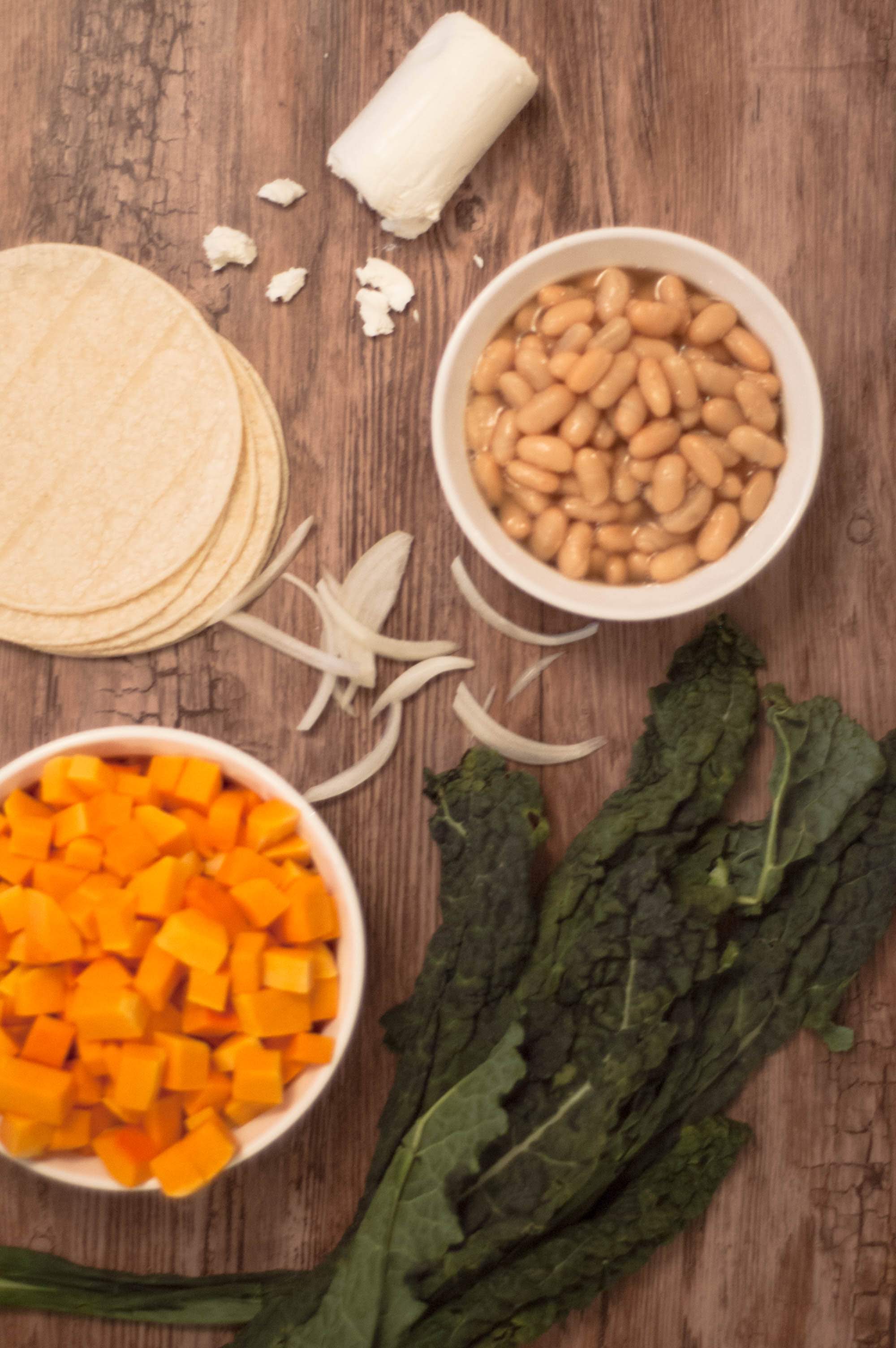 All of the ingredients to make pumpkin tacos in individual containers