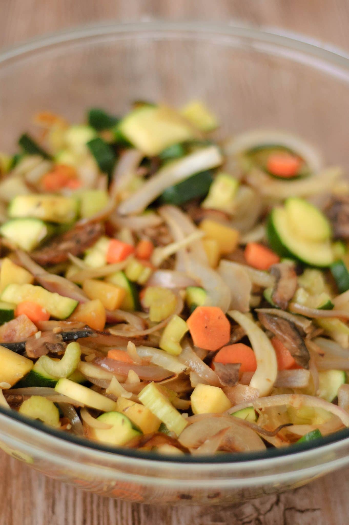 Autumn vegetable mixture of carrots, onions, zucchini, and turnips.