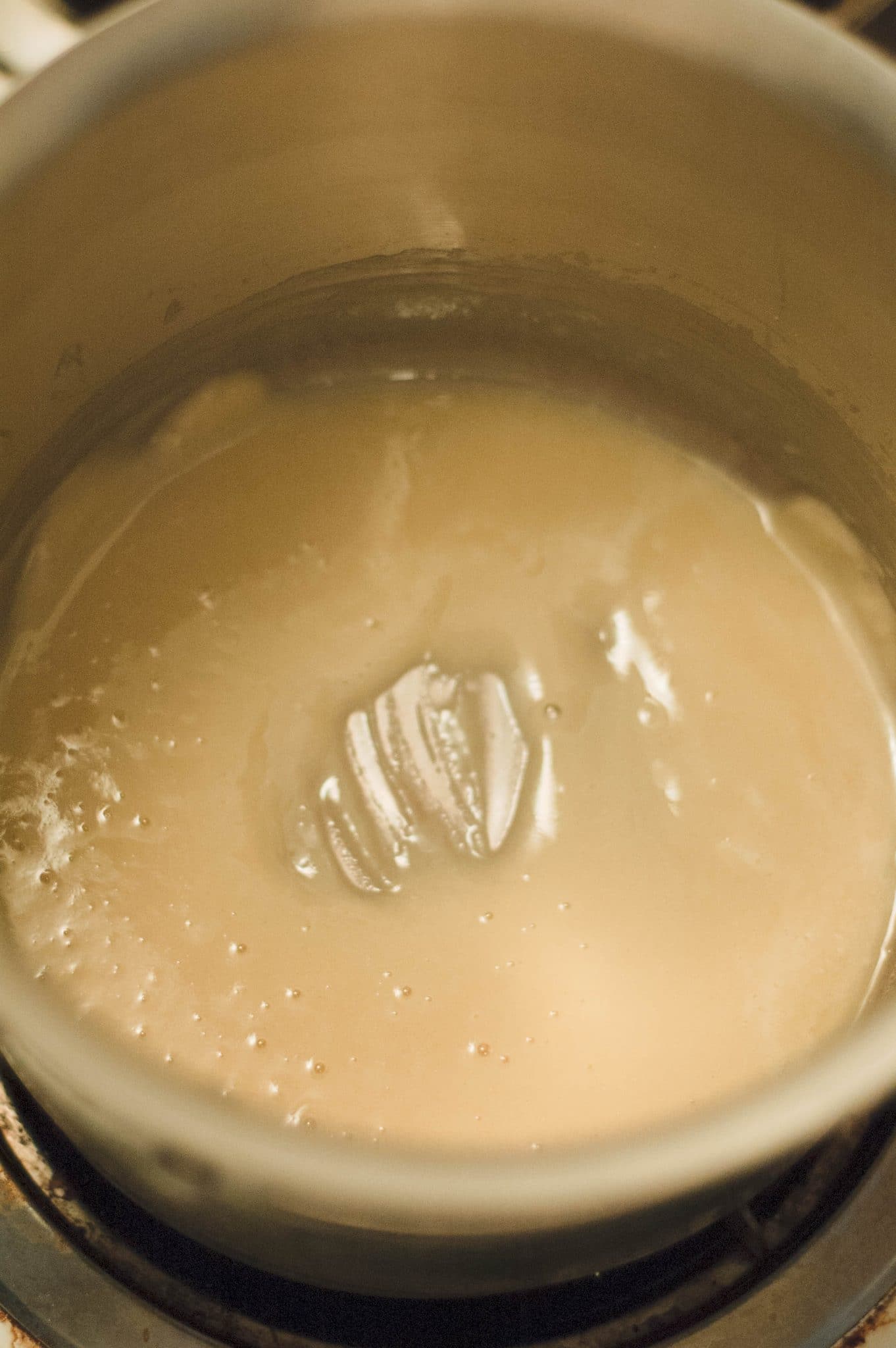 A roux in the bottom of a pot.