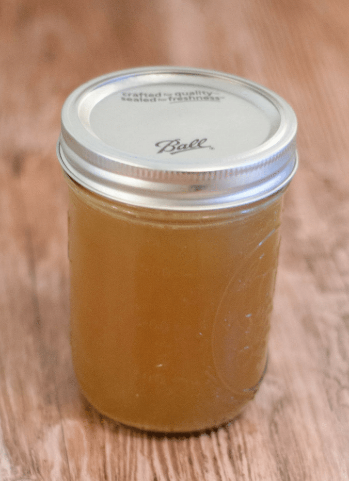 A mason jar of brown stock