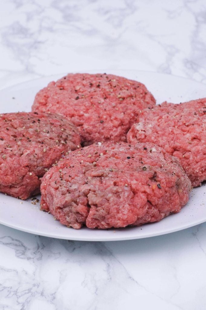 Completed boursin stuffed breakfast burgers.