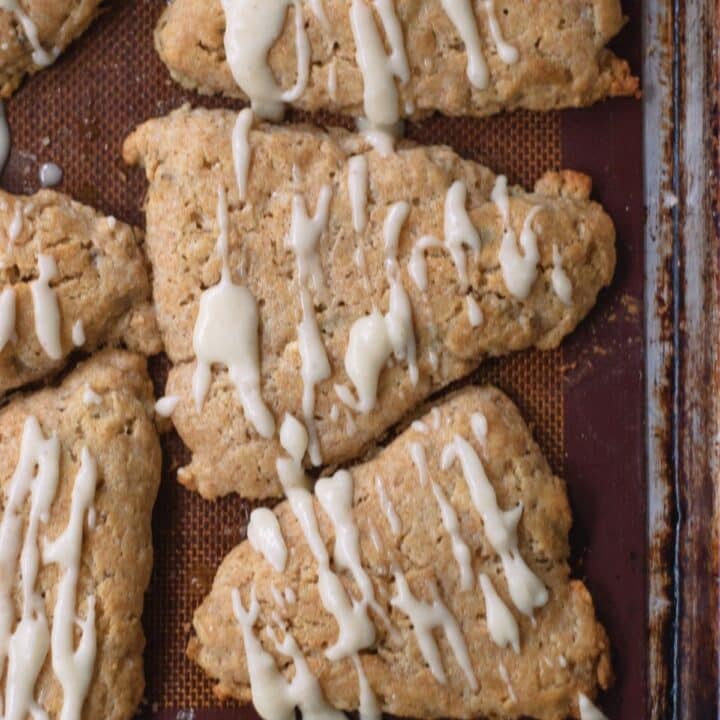 A group of scones with a drizzle on top