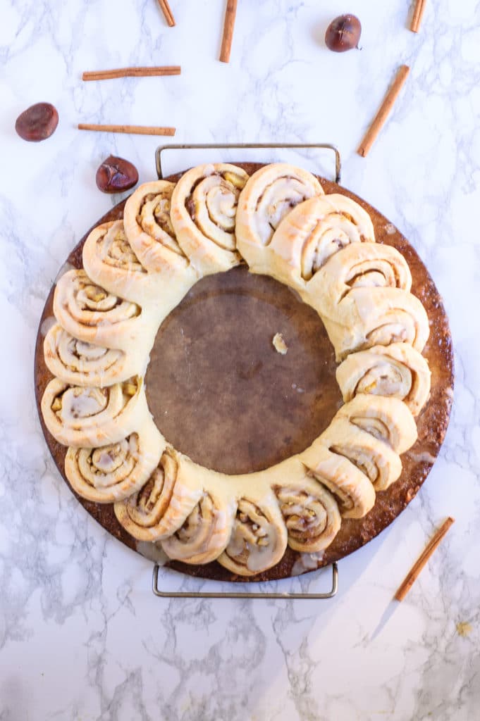 This festive & fun chestnut roll wreath is perfect for Christmas morning! This holiday treat will be a new family favorite and a great breakfast tradition!