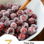 Close up image of sugared cranberries with "3 tips for making stunning sugared cranberries" text