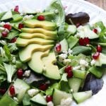 One white plate with green goddess winter salad on it