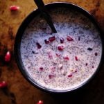 bowl of chia seed pudding with pomegranate ariils