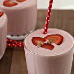 strawberry smoothie with red polka dot straw
