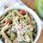 White bowl of pasta on a blue checkered napkin