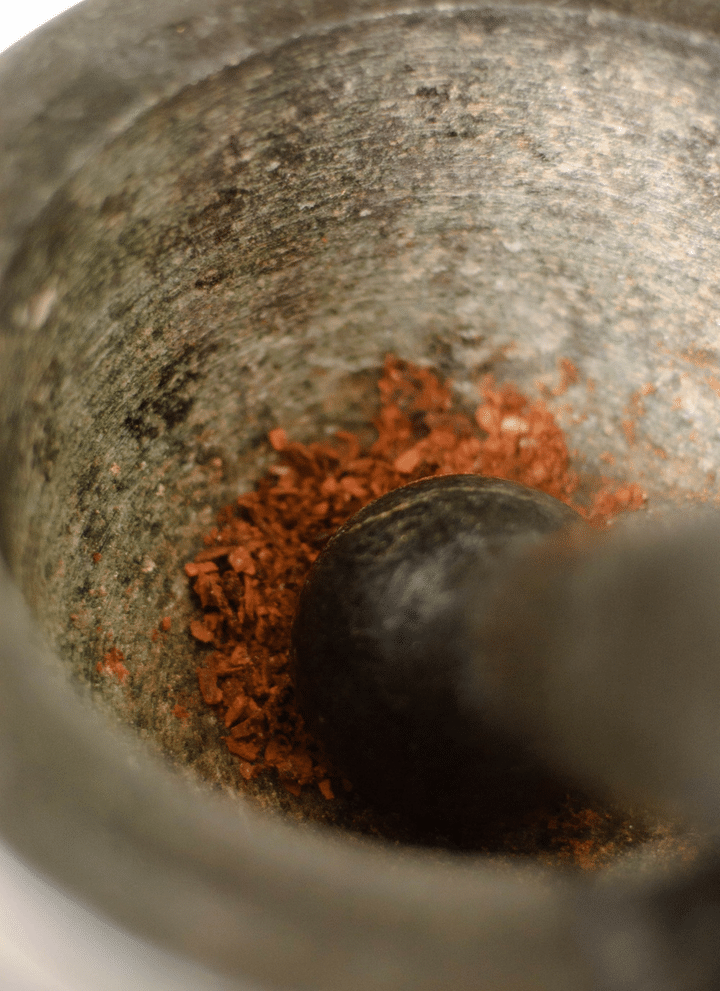 Spices ground in a mortar and pestle