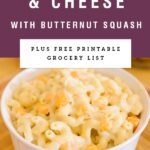 A white bowl of creamy mac and cheese with butternut squash. Recipe title above it is on a purple background.