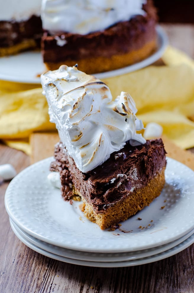 a slice of sky high s'mores pie on a plate