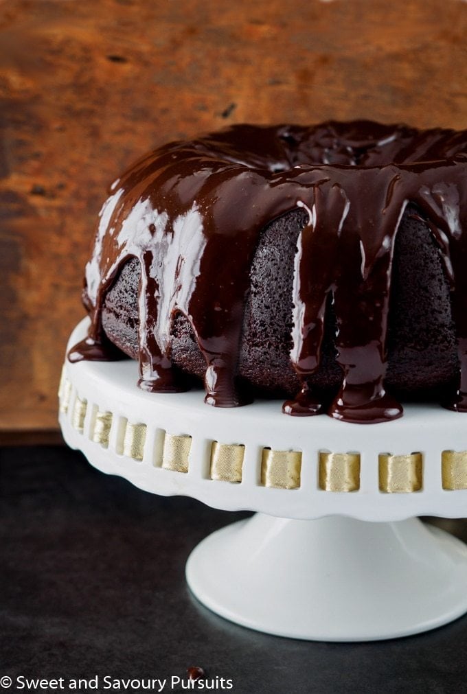 bundt cake on a white cake stand