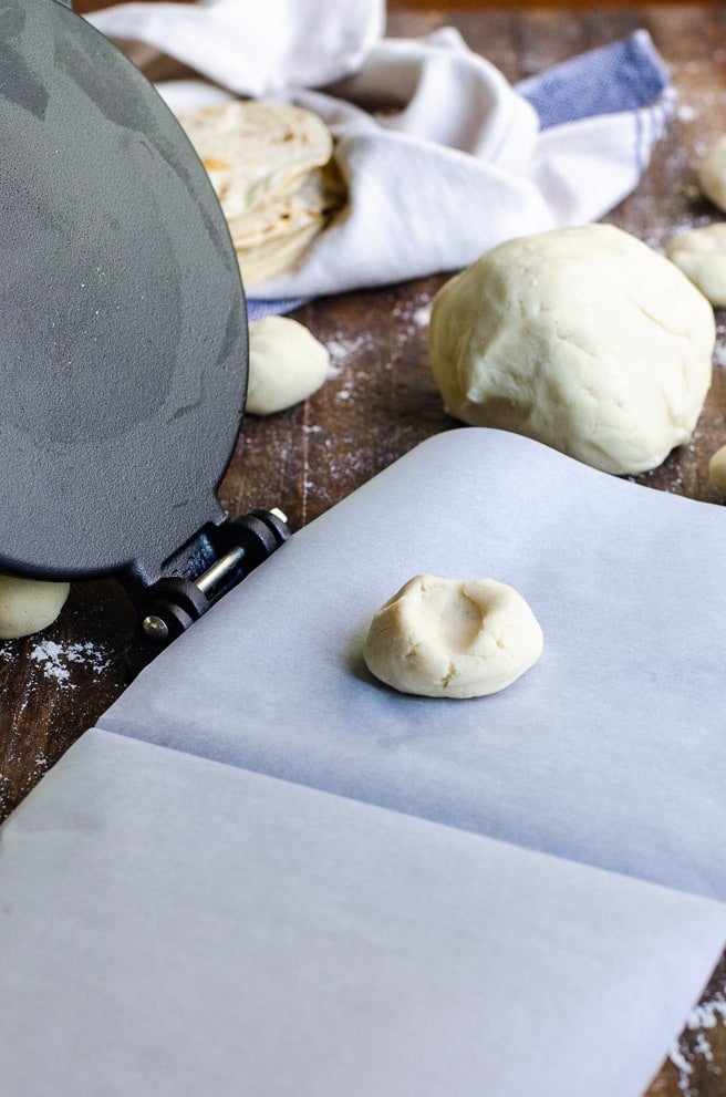 how to use a tortilla press step one: dough in the center of the cast iron tortilla press