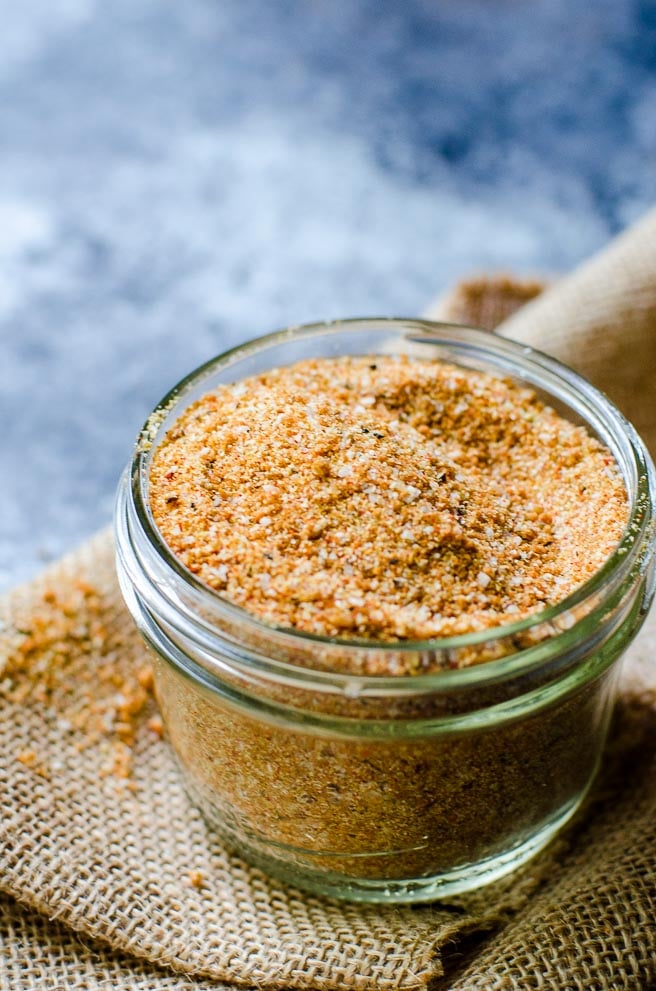 a mason jar filled with baby back ribs dry rub