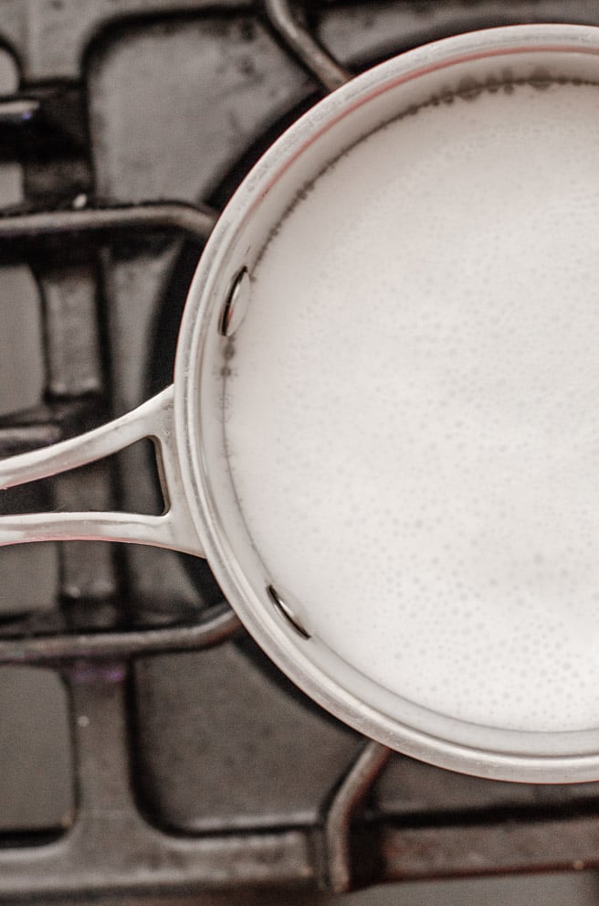 bubbles forming to show when scalded milk is ready