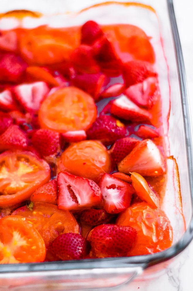 A pan of roasted strawberries and tomatoes.