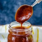 closeup of a bbq sauce dripping off a spoon