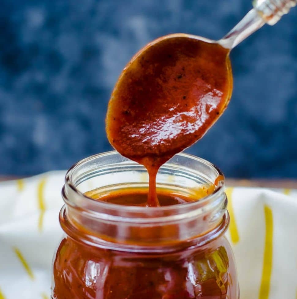 closeup of a bbq sauce dripping off a spoon