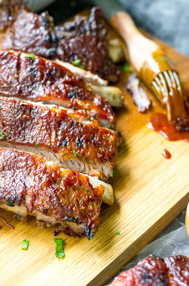 close up of how to cook ribs in the oven so they're tender