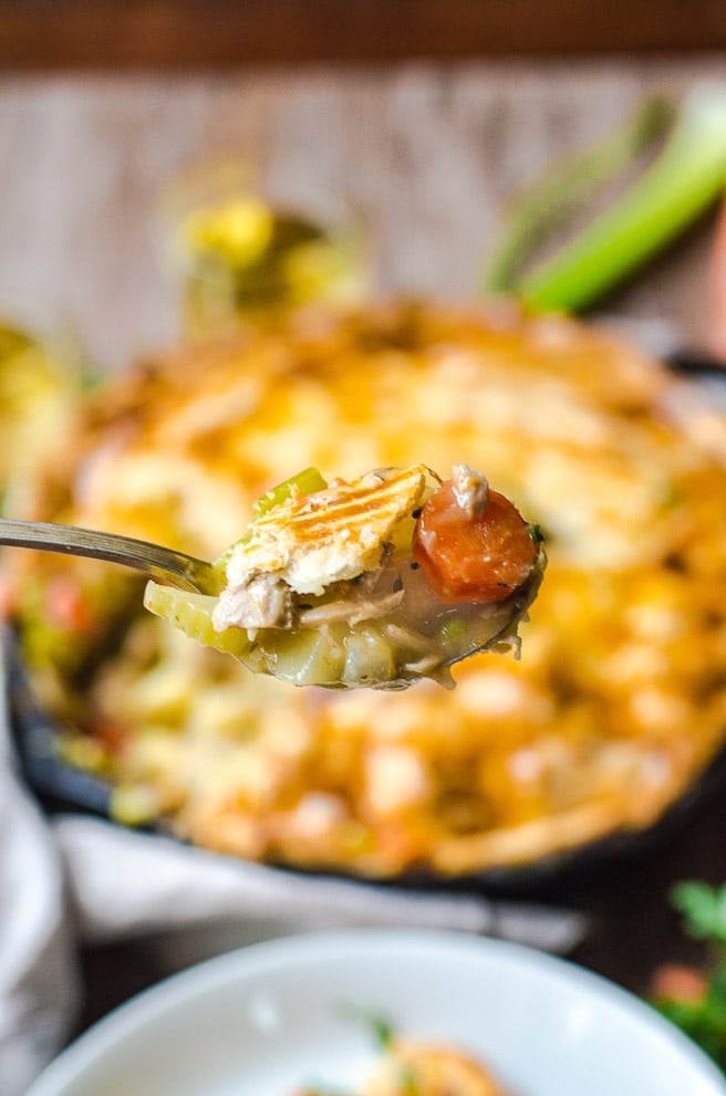 Close up of a forkful of pot pie filling.