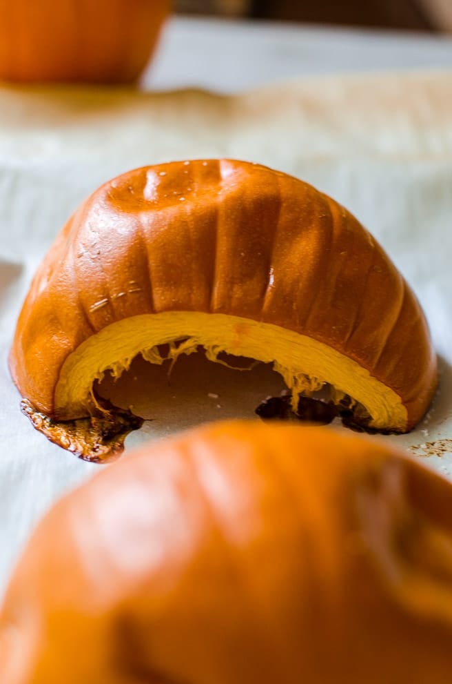 A cooking pumpkin being roasted for puree.