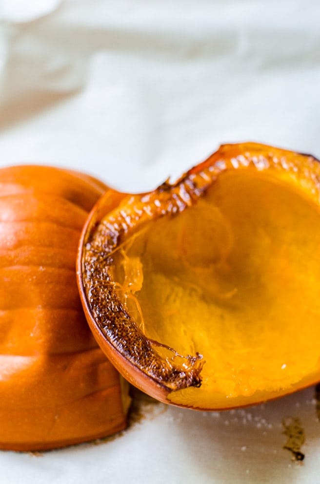 Close up of the caramelization on the pumpkin flesh that comes from roasting.  It also shoes the natural separation of flesh from skin.  