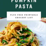 A tall serving of pumpkin pasta on a plate. Recipe title above it is on a green background.