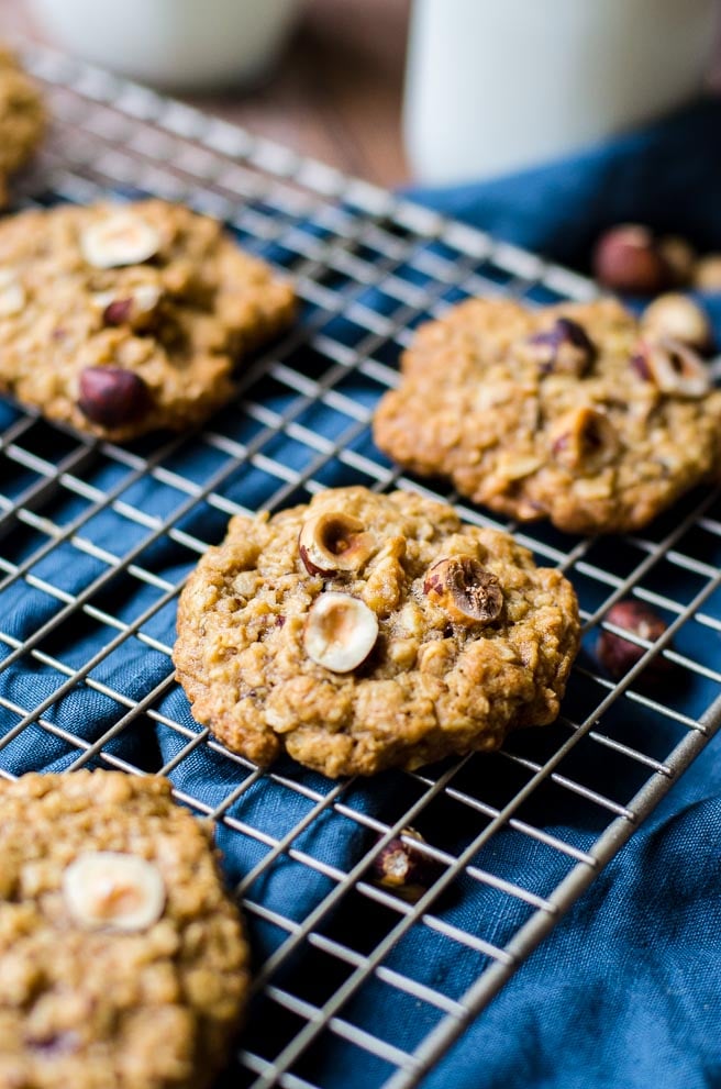 A close up of chopped hazelnuts in a cookie.