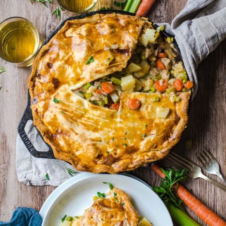 A pot holdung a freshly cooked, perfectly brown pot pie