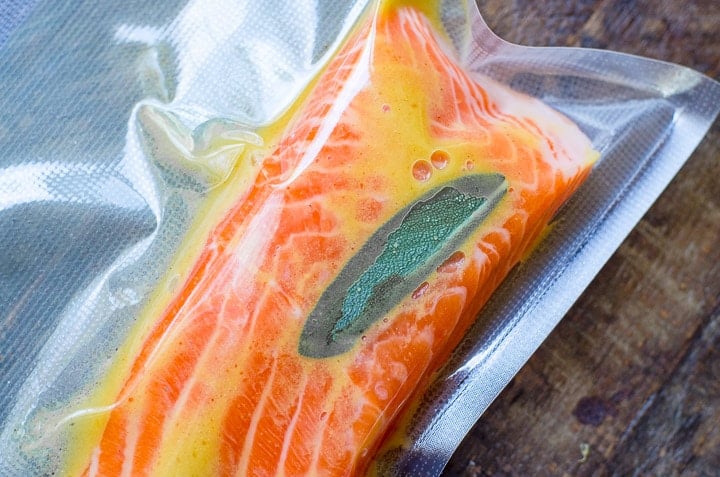 A vacuum sealed bag of maple dijon salmon ready to go into the sous vide.