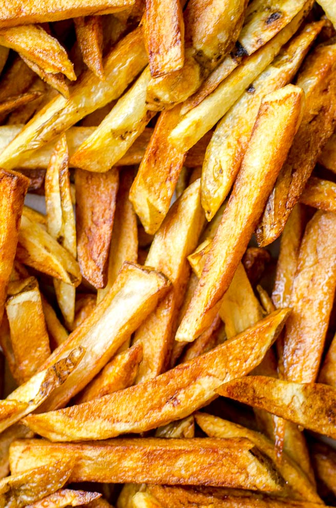 Close up of a pile of french fries.