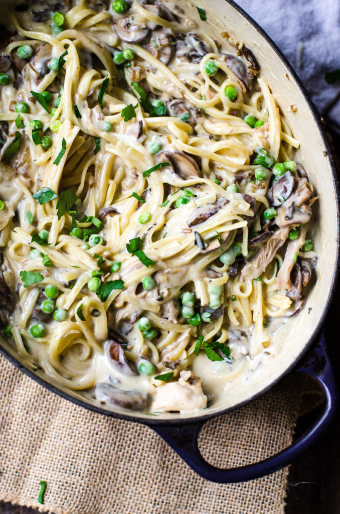 Turkey meat, frozen peas, and mushrooms folded into linguine and sauce.