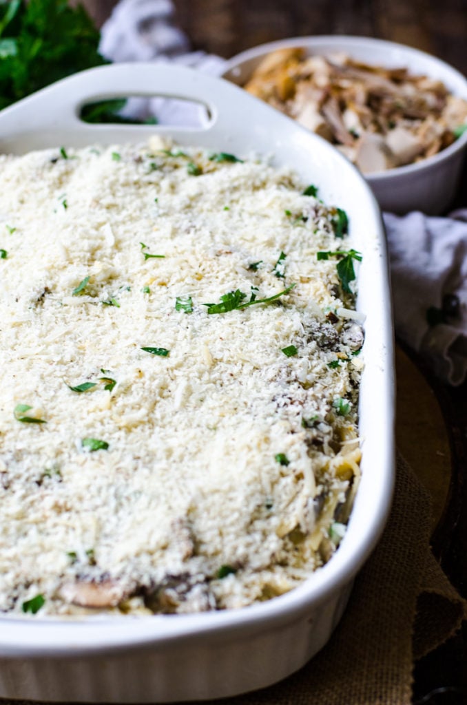 Panko breadcrumb mixture spread on top of a filled casserole dish.