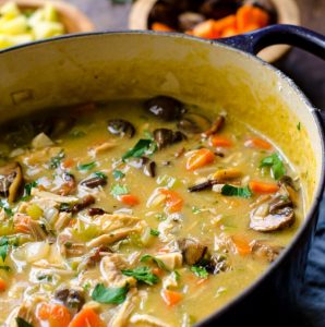 a pot filled with leftover turkey vegetable soup