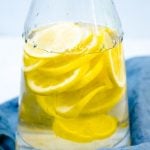 Close up of lemons in a pitcher.