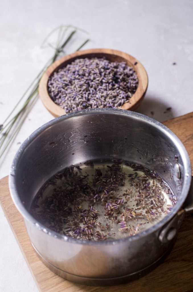 A pot of water with lavender steeping in it.