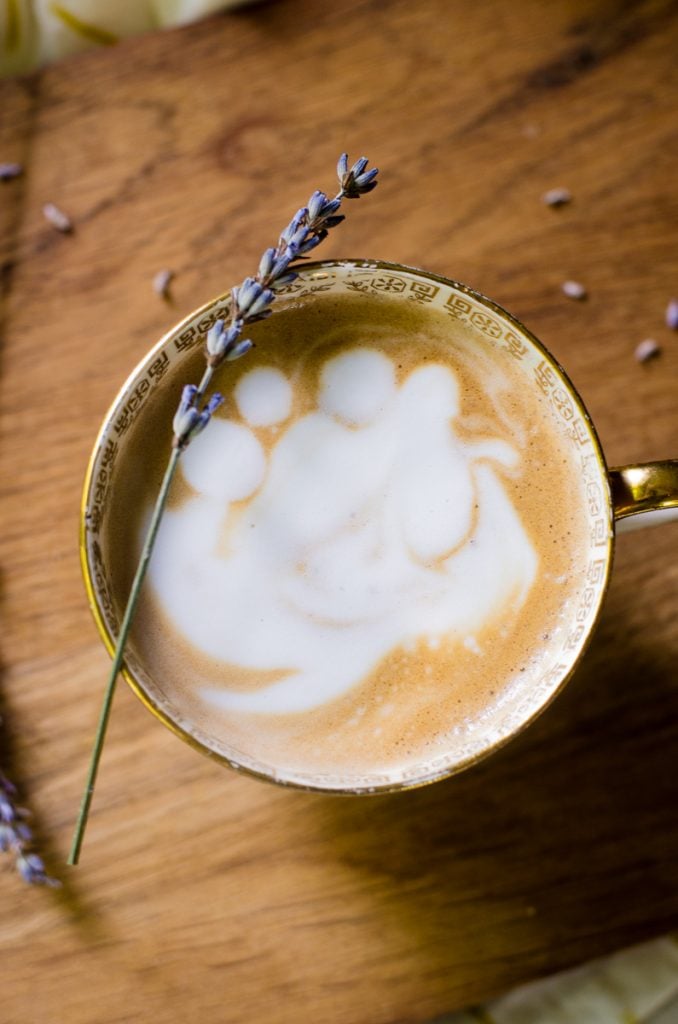 Overhead view of latte art looking like a cloud.
