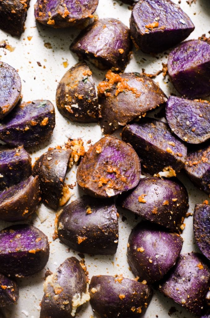 Cooked purple potatoes with garlic.