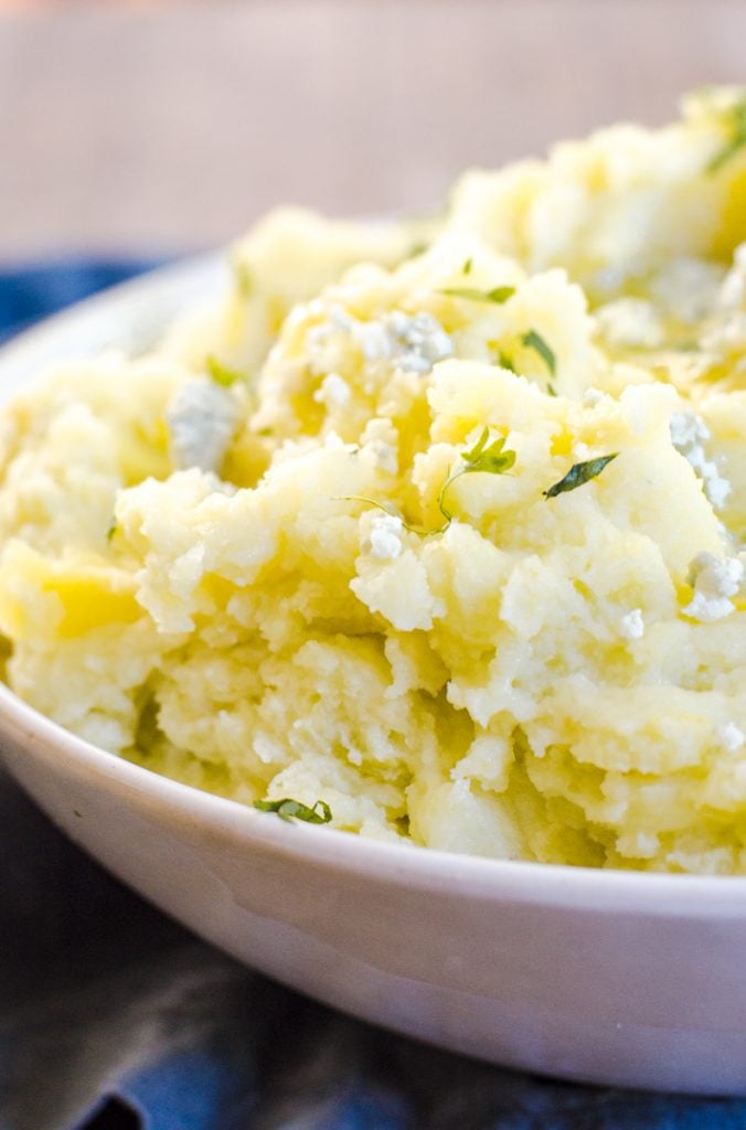Close up of the fluffy texture of blue cheese mashed potatoes.