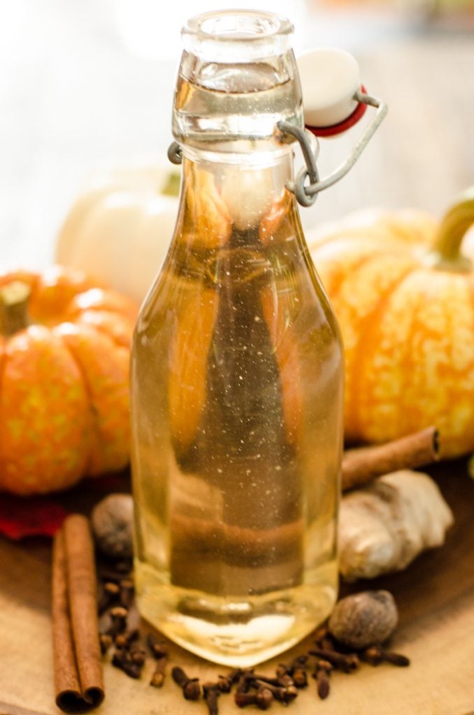 Close up of the color of homemade pumpkin spice syrup.