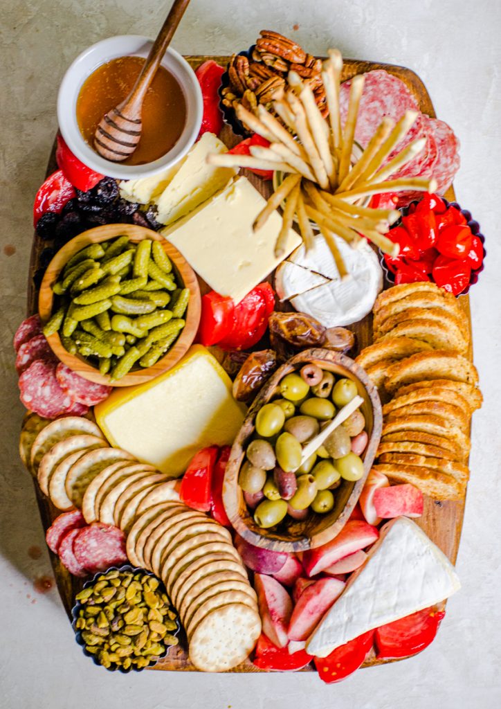 Overhead view of a summer cheese board.