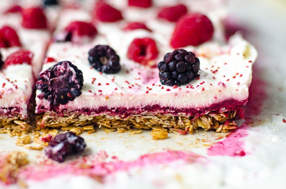 Close up of layers granola, berries, and yogurt.