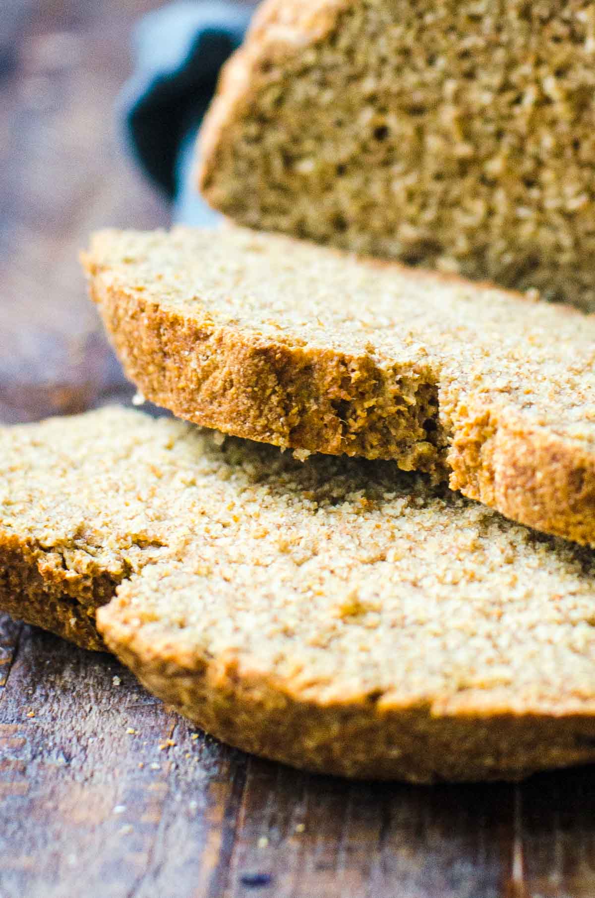 Close up of the crust of cut slices of soda bread.