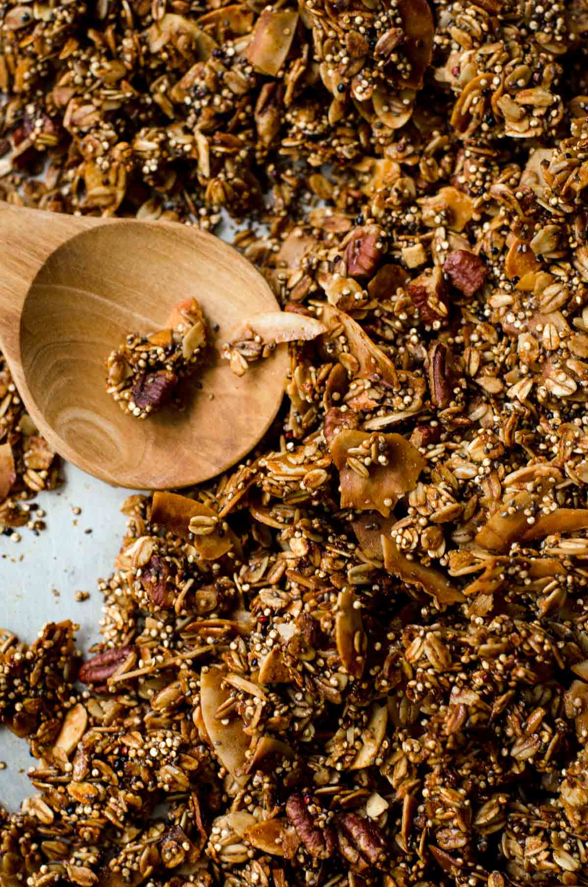 Close up of wooden spoon with granola.