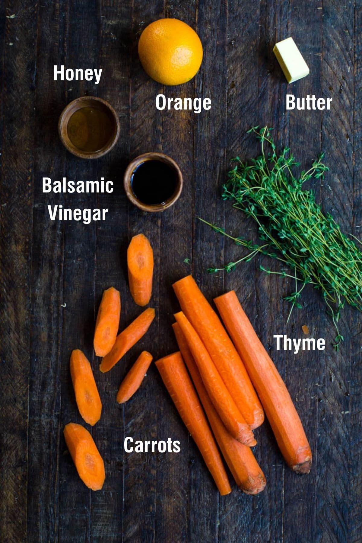 Labeled ingredients for making honey balsamic glazed carrots.