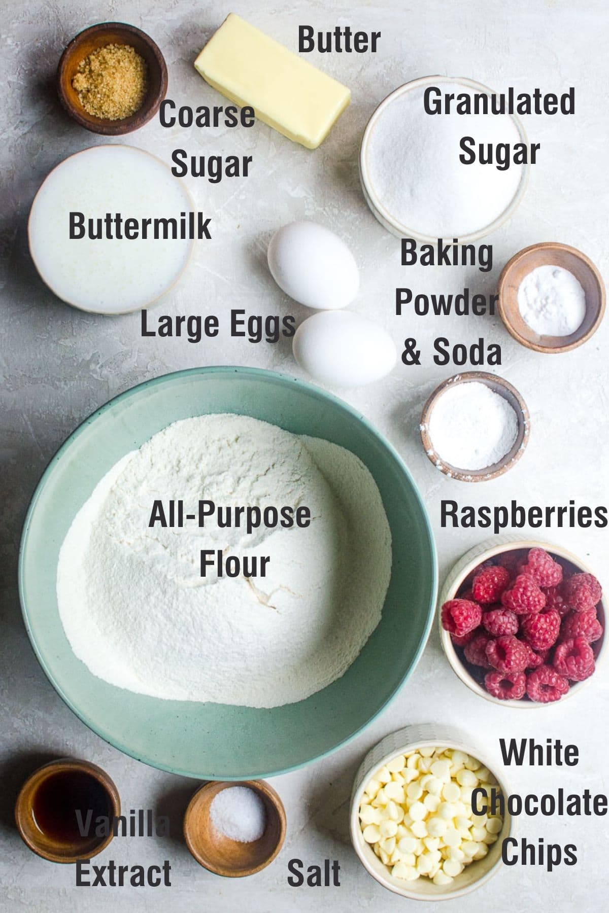 Labeled ingredients for making raspberry white chocolate chip muffins.